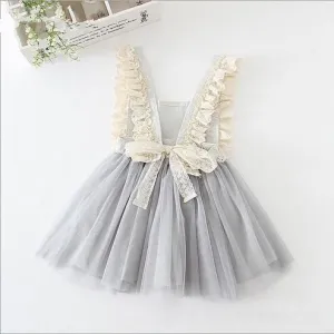 Lacey open bow-back dress
