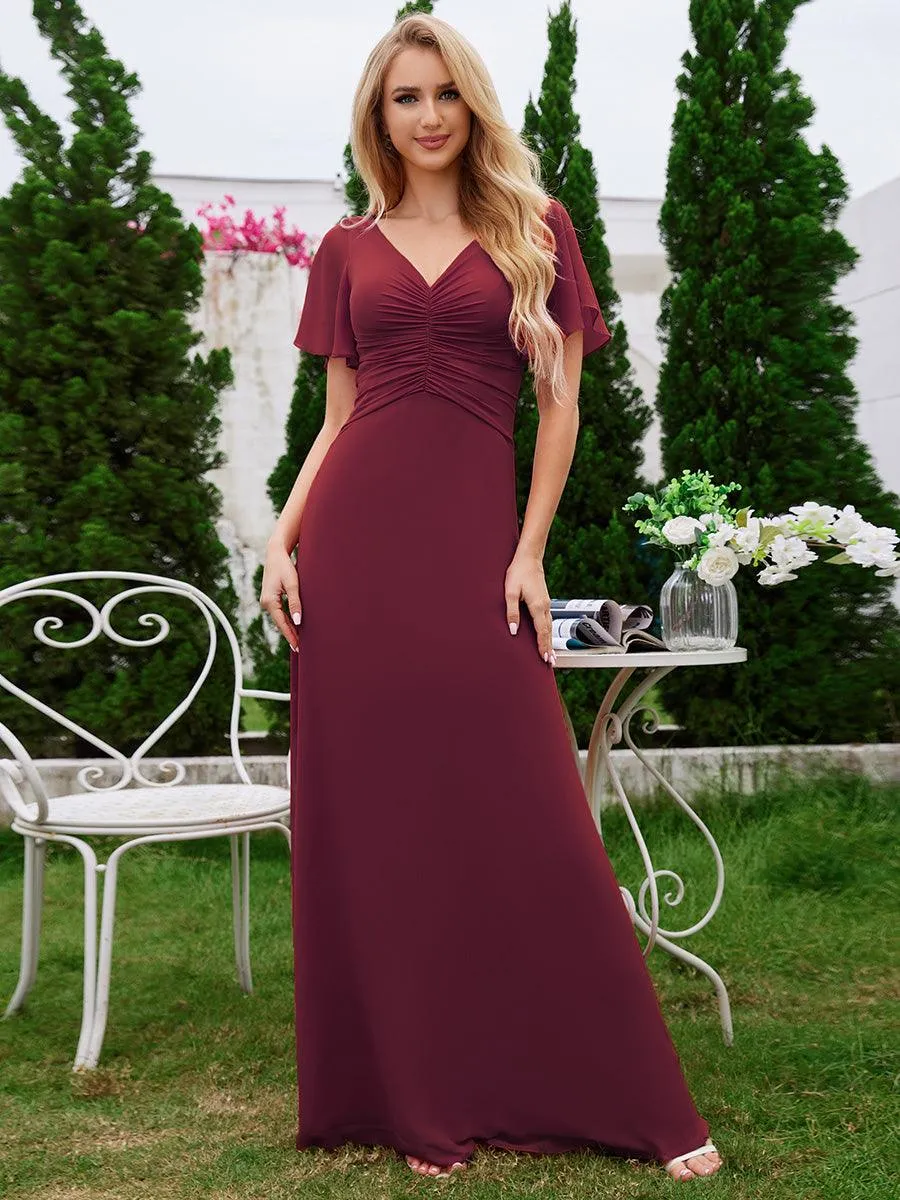 Robe de demoiselle d'honneur trapèze en mousseline à manches volantées avec plis à col en V
