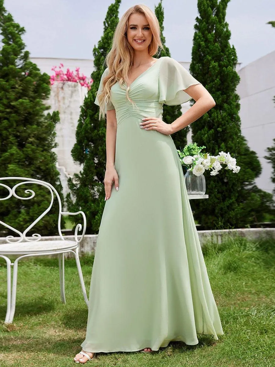 Robe de demoiselle d'honneur trapèze en mousseline à manches volantées avec plis à col en V