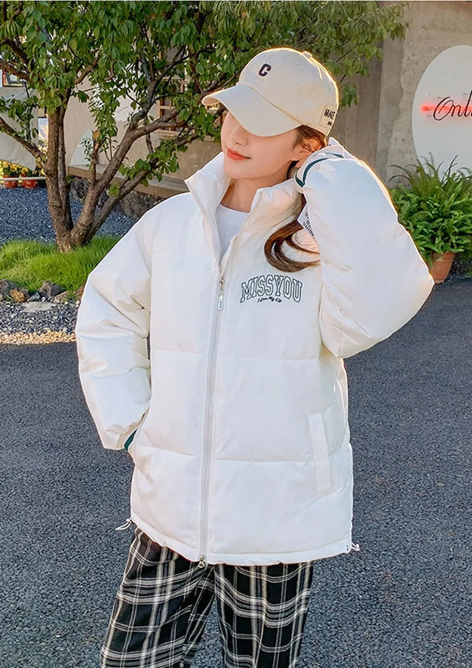 Stylish padded zip-up puffer jacket with letter print detail