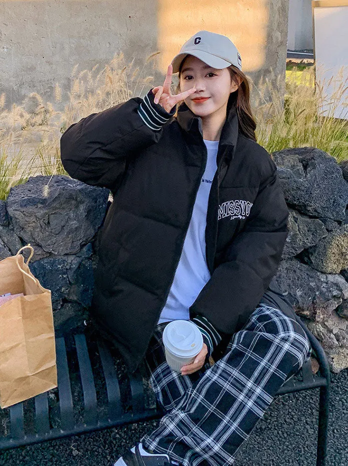 Stylish padded zip-up puffer jacket with letter print detail