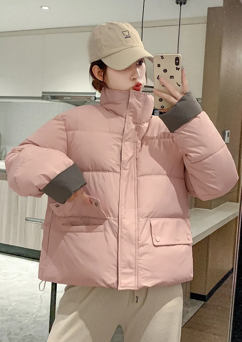 Women's windproof zip-up puffer jacket with patchwork design and stain-resistant material