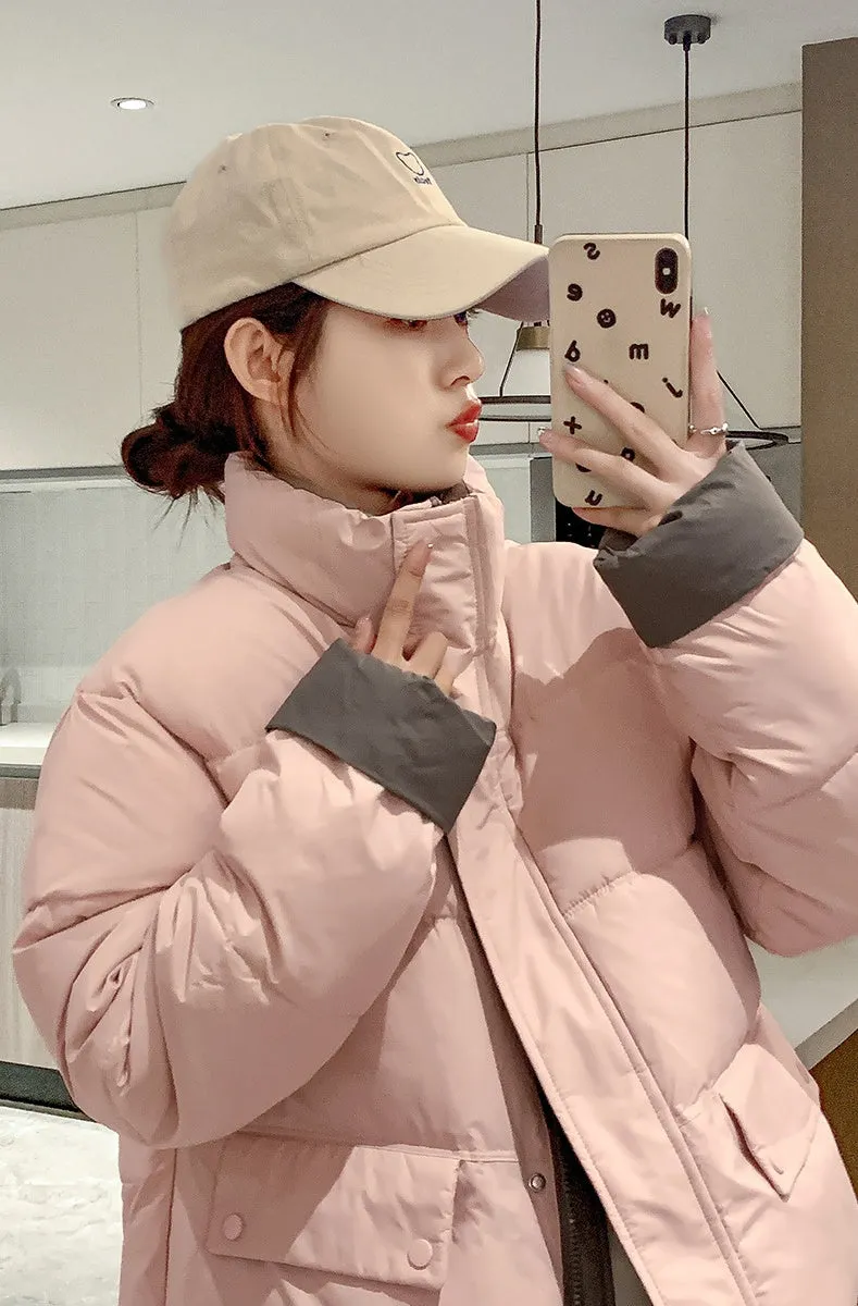 Women's windproof zip-up puffer jacket with patchwork design and stain-resistant material
