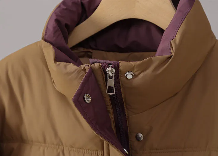 Women's windproof zip-up puffer jacket with patchwork design and stain-resistant material