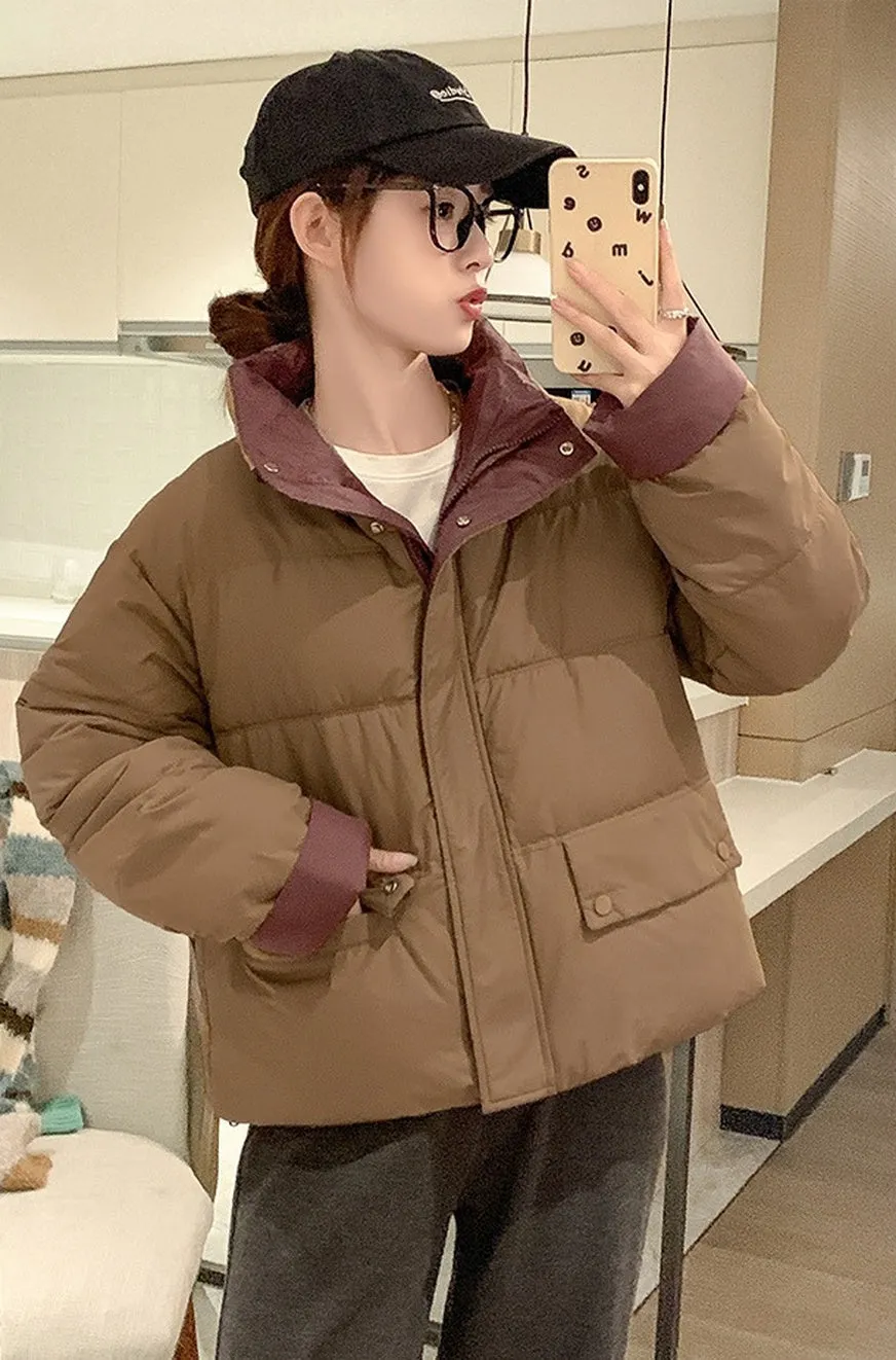 Women's windproof zip-up puffer jacket with patchwork design and stain-resistant material
