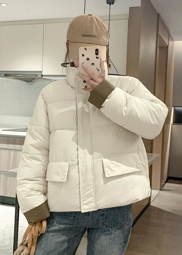 Women's windproof zip-up puffer jacket with patchwork design and stain-resistant material