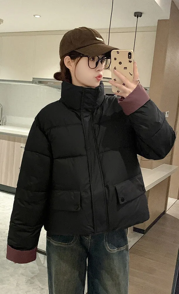 Women's windproof zip-up puffer jacket with patchwork design and stain-resistant material