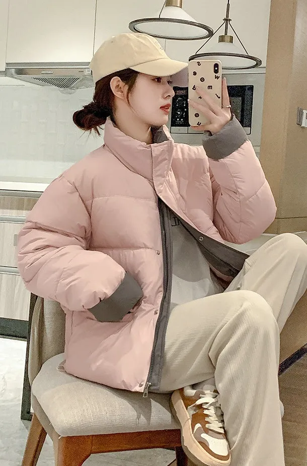 Women's windproof zip-up puffer jacket with patchwork design and stain-resistant material