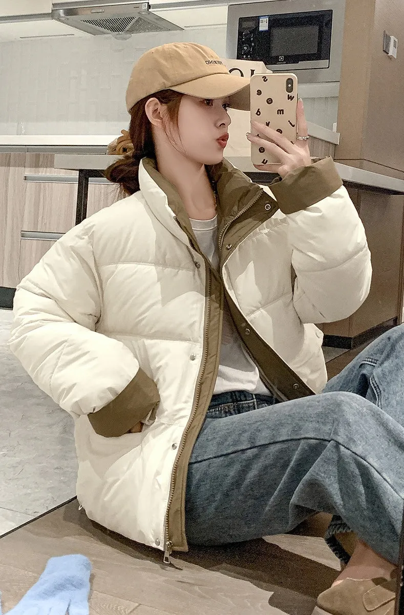 Women's windproof zip-up puffer jacket with patchwork design and stain-resistant material