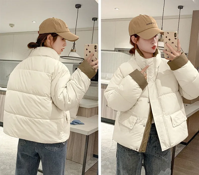 Women's windproof zip-up puffer jacket with patchwork design and stain-resistant material
