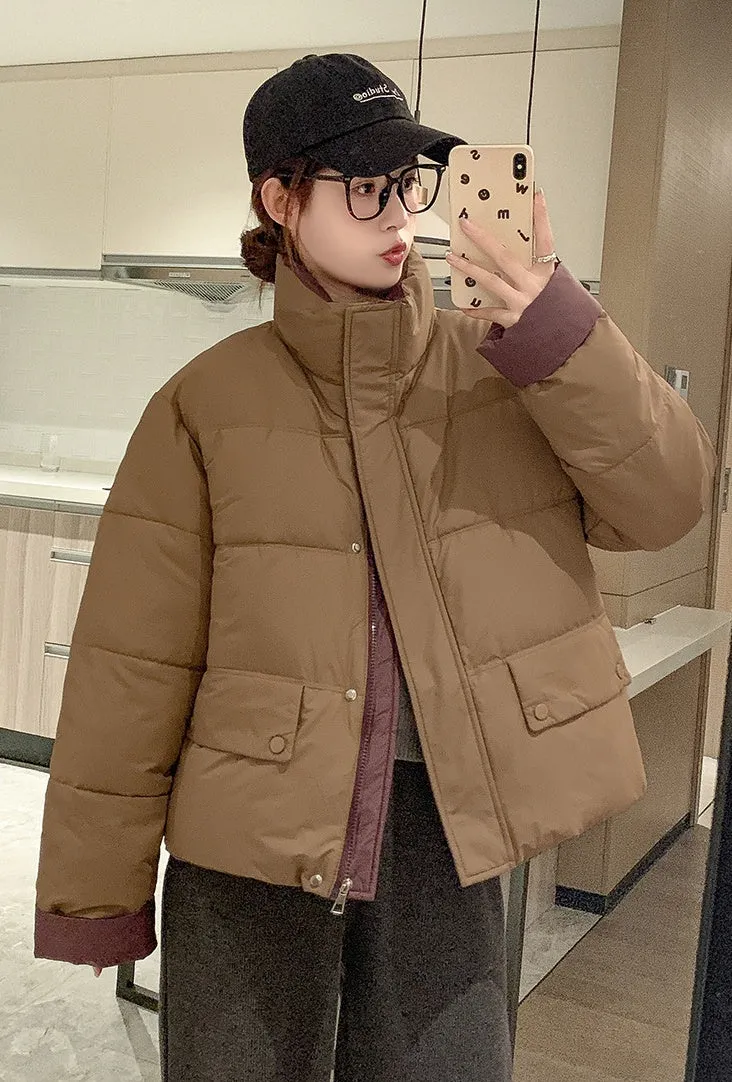 Women's windproof zip-up puffer jacket with patchwork design and stain-resistant material