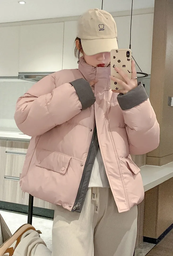 Women's windproof zip-up puffer jacket with patchwork design and stain-resistant material